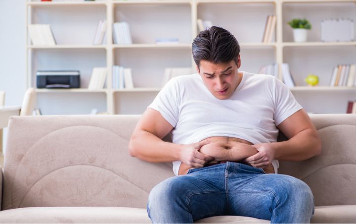 men-holding-her-belly