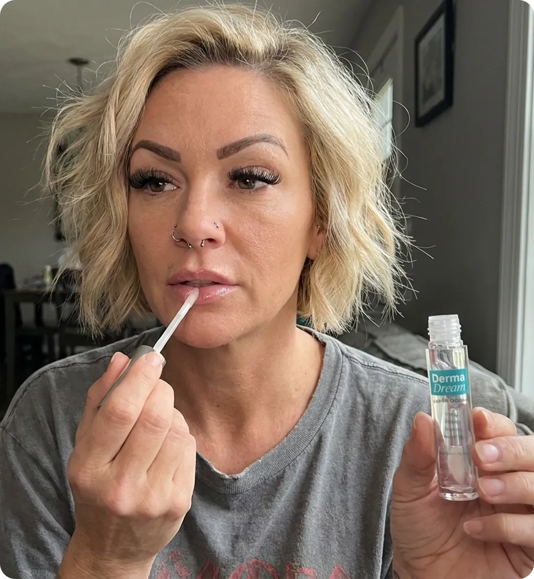Woman applying LipFill Booster
